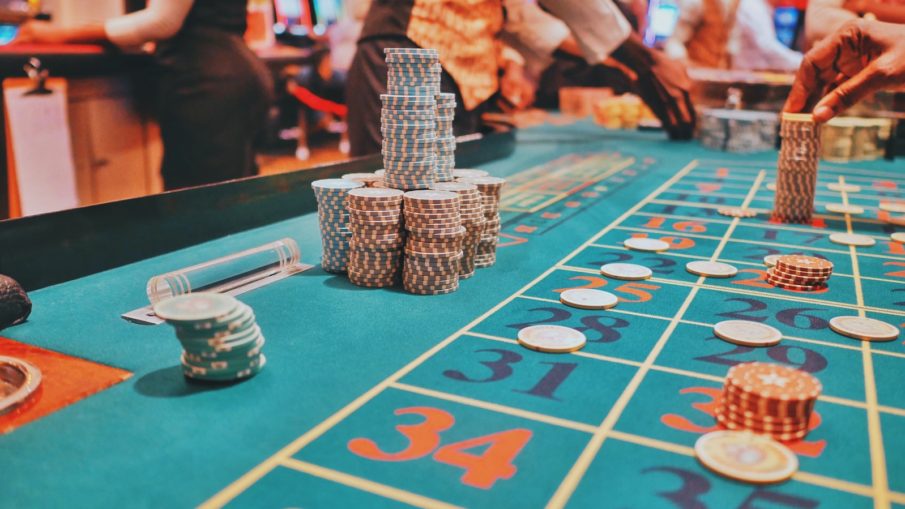 a casino table with a lot of chips on it